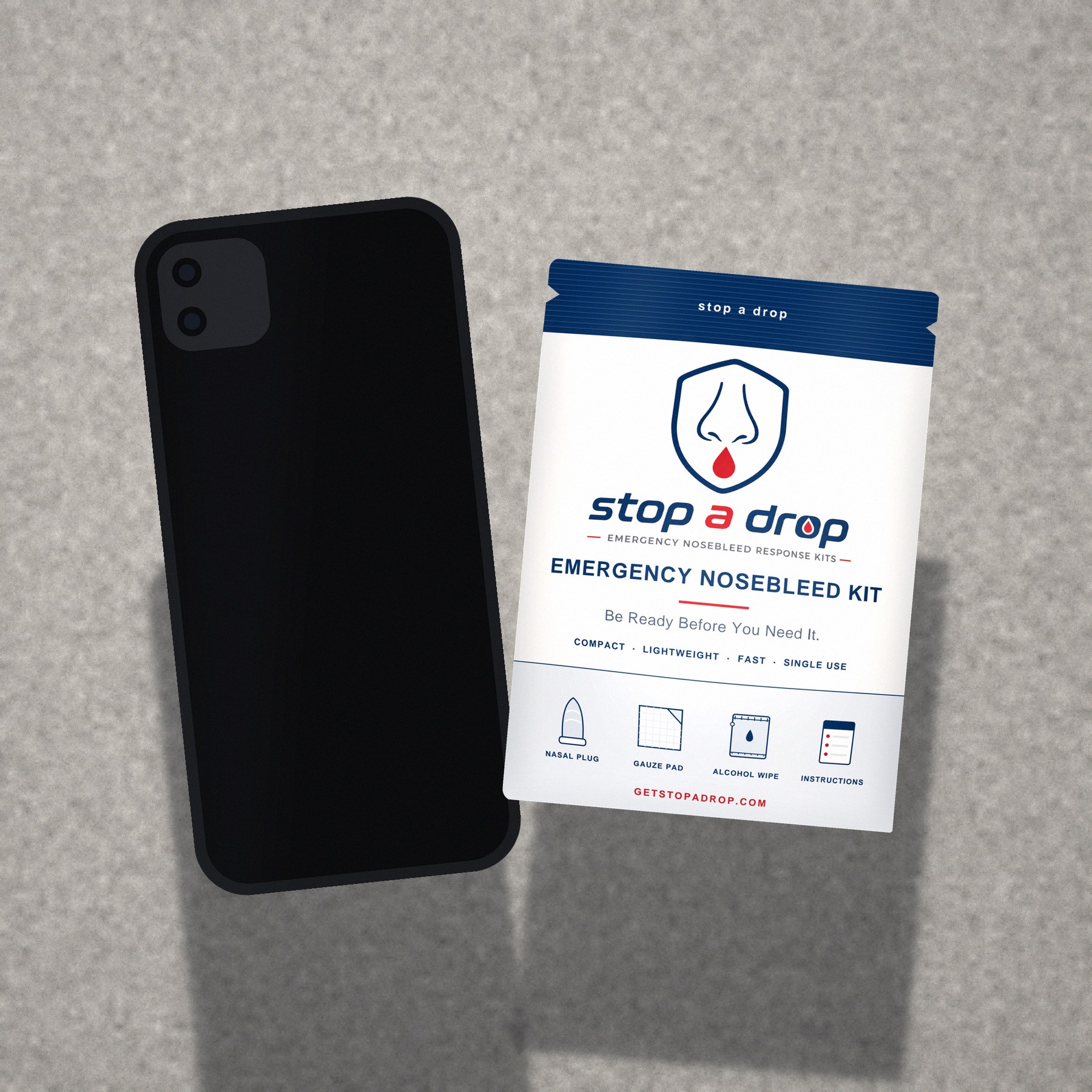 Stop A Drop kit next to a smartphone for scale